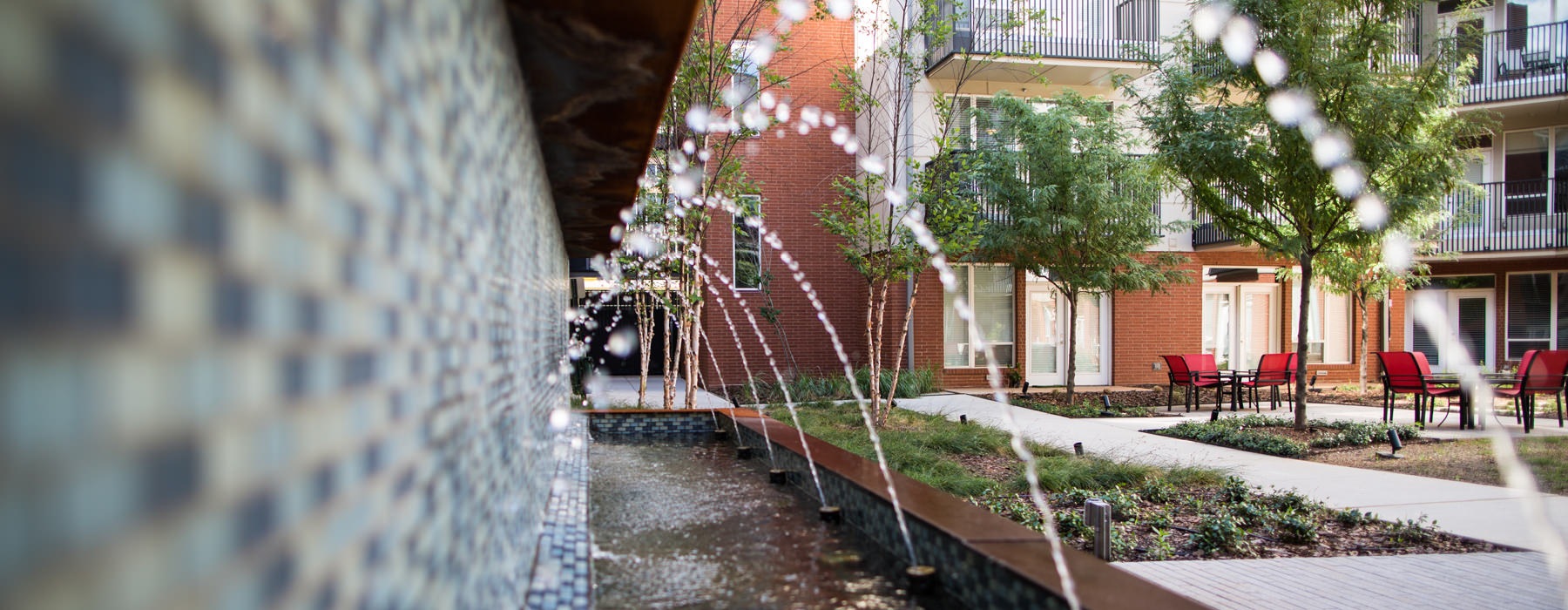 water fountains along the courtyard sidewalk